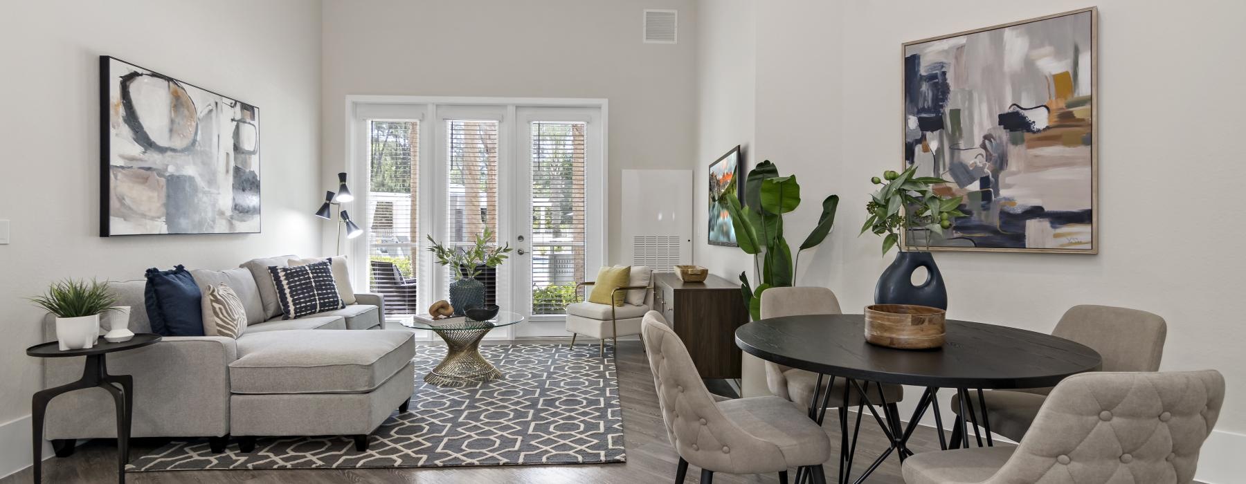 a living room with a couch and a table