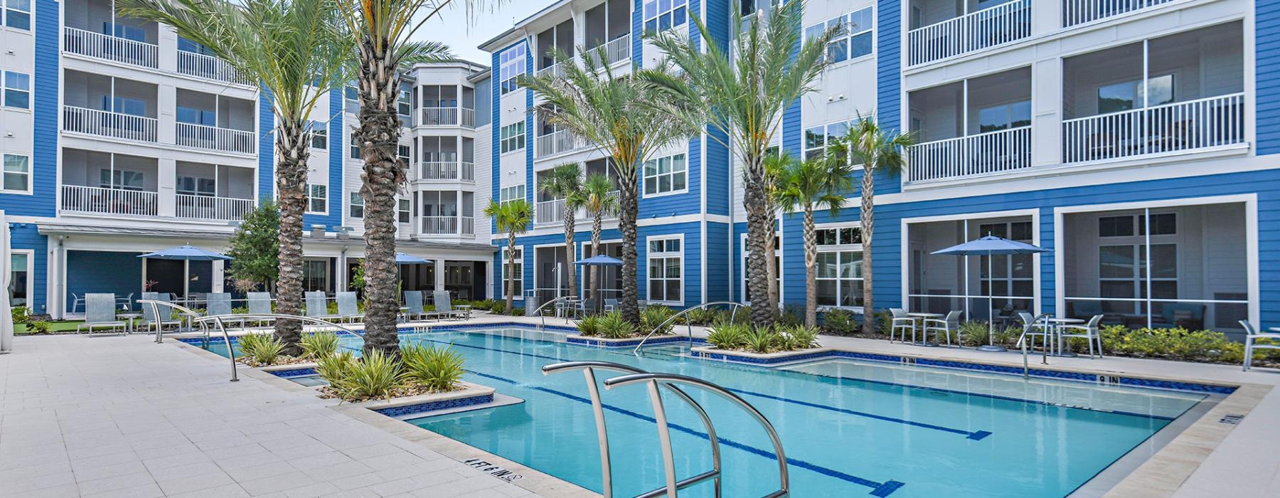 a pool in front of a building
